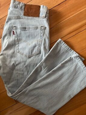 Levi's light blue denim jeans with brown leather patch 34 ( fit 10 us size )
